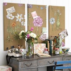 grey drawer brown pin board and flower pot