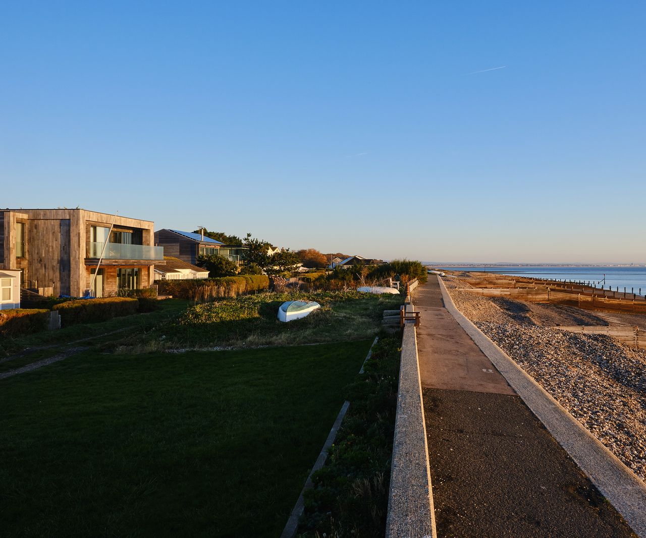 A contemporary seaside property with views of the beach