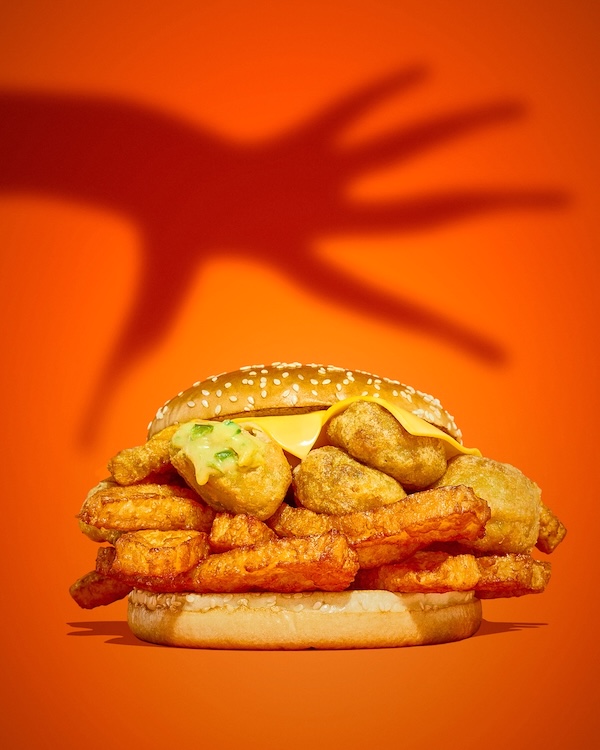 BurgerKingHalloween Cheese burger with a shadow over it