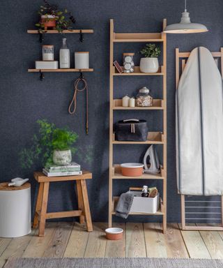 blue walls in a utility room with wood ladder shelving and open shelving - Garden-Trading-AW20-Utility-Laundry-+-Pet