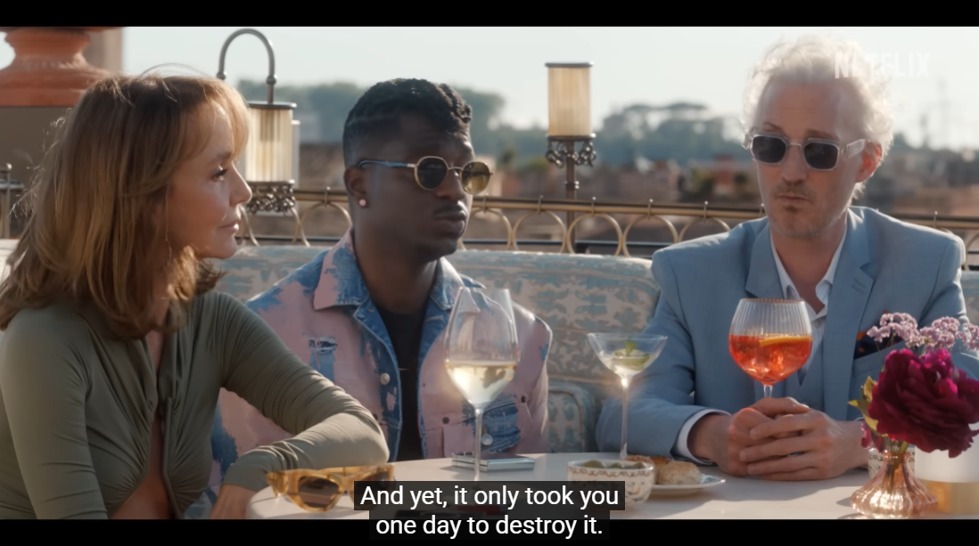 Two stills from a scene set on a sun-filled rooftop with beautifully dressed people enjoying an afternoon drink.