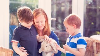 Children with rabbit