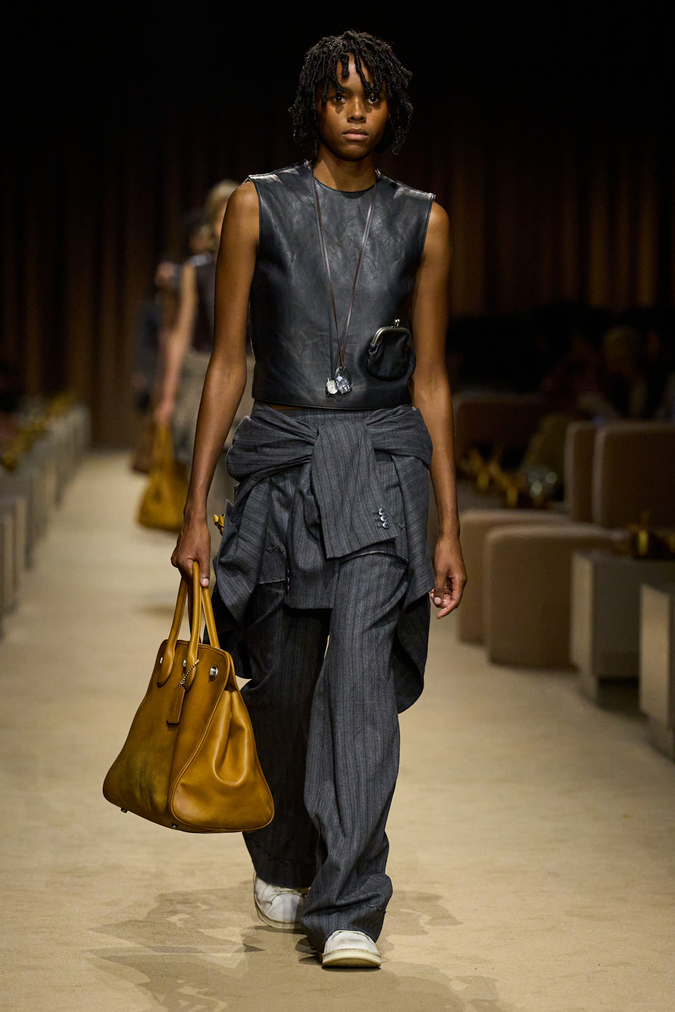 Coach's new Turnlock Tote Bag on the Spring 2027 runway at New York Fashion Week