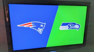 Patriots vs Seahawks YouTube TV Promo banner on a TV