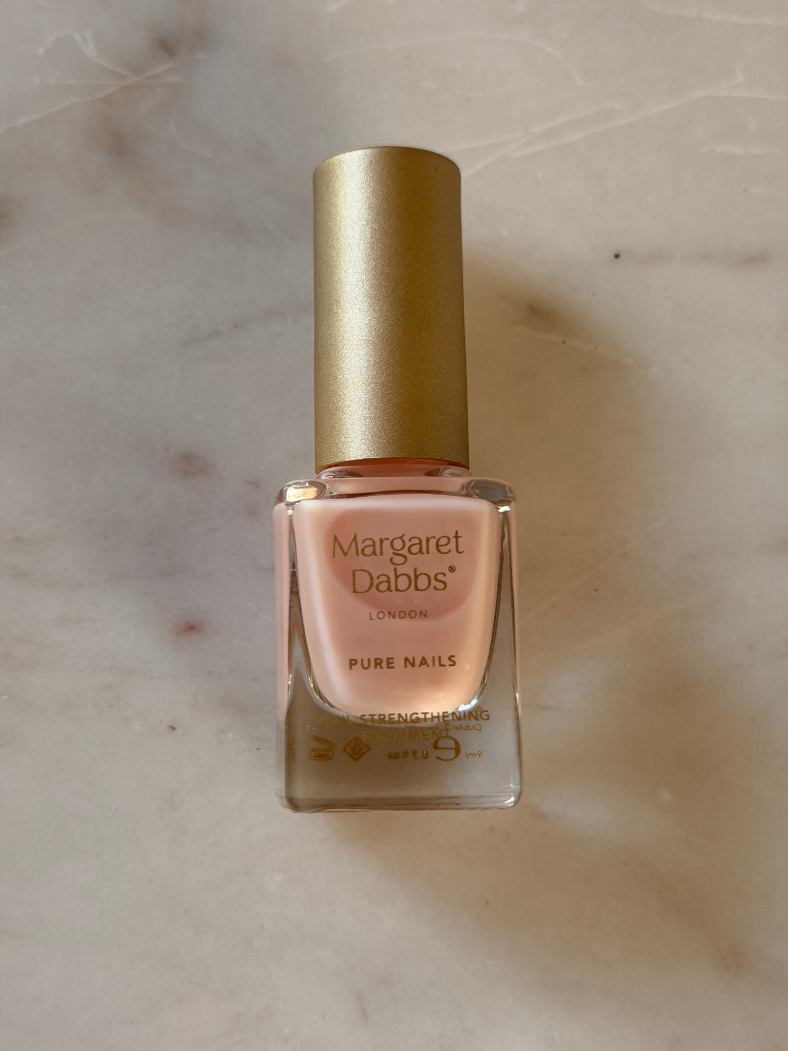 A bottle of Margaret Dabbs Nail Strengthening Treatment