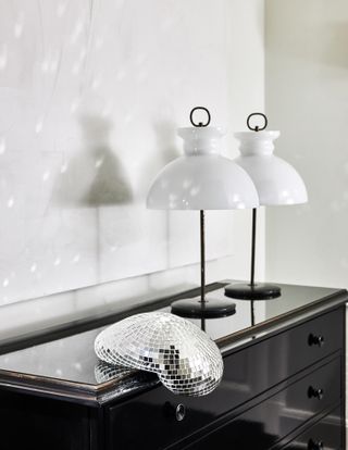 Small melted disco ball by Rotganzen on the edge of a console table