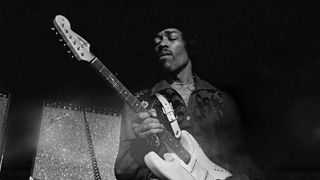 Jimi Hendrix playing a Fender Stratocaster guitar, while performing live onstage, 1968