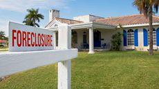 foreclosure sign in front of a florida home