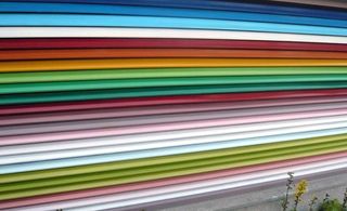 ﻿Rainbow-painted grates as part of a public art exhibition