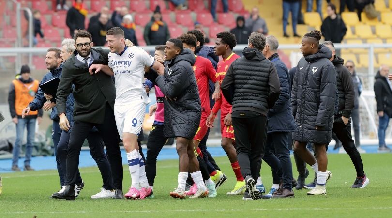 Lecce coach Roberto D&#039;Aversa and Hellas Verona player Thomas Henry clash after a Serie A match in March 2024.