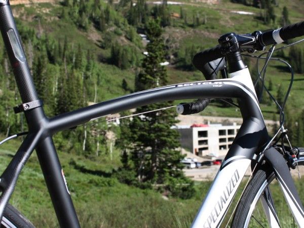 The curved top tube supposedly allows for more front-end flex over bumps.