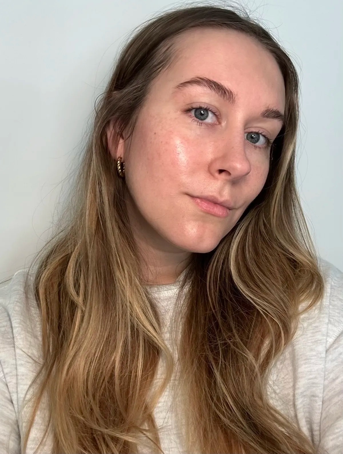 A woman after wearing a face mask.