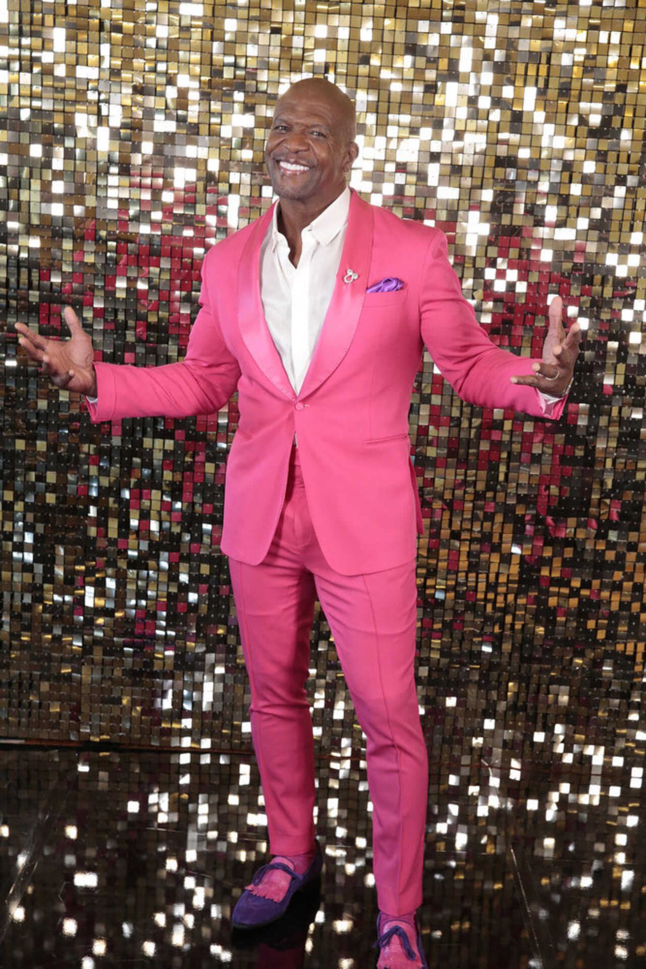 Terry Crews wearing a pink suit for AGT Season 20&#039;s Quarterfinals 2