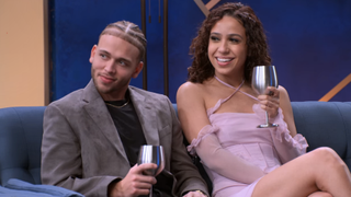 jake and rae holding silver glasses on the ultimatum reunion