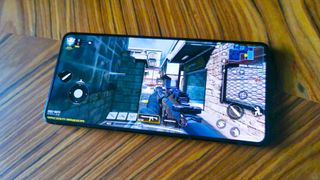 Asus ROG Phone 8 Pro with COD Mobile gameplay on screen