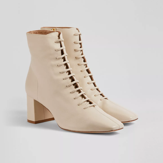 white pointed toe lace up boots
