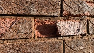 Close up of spalled brick