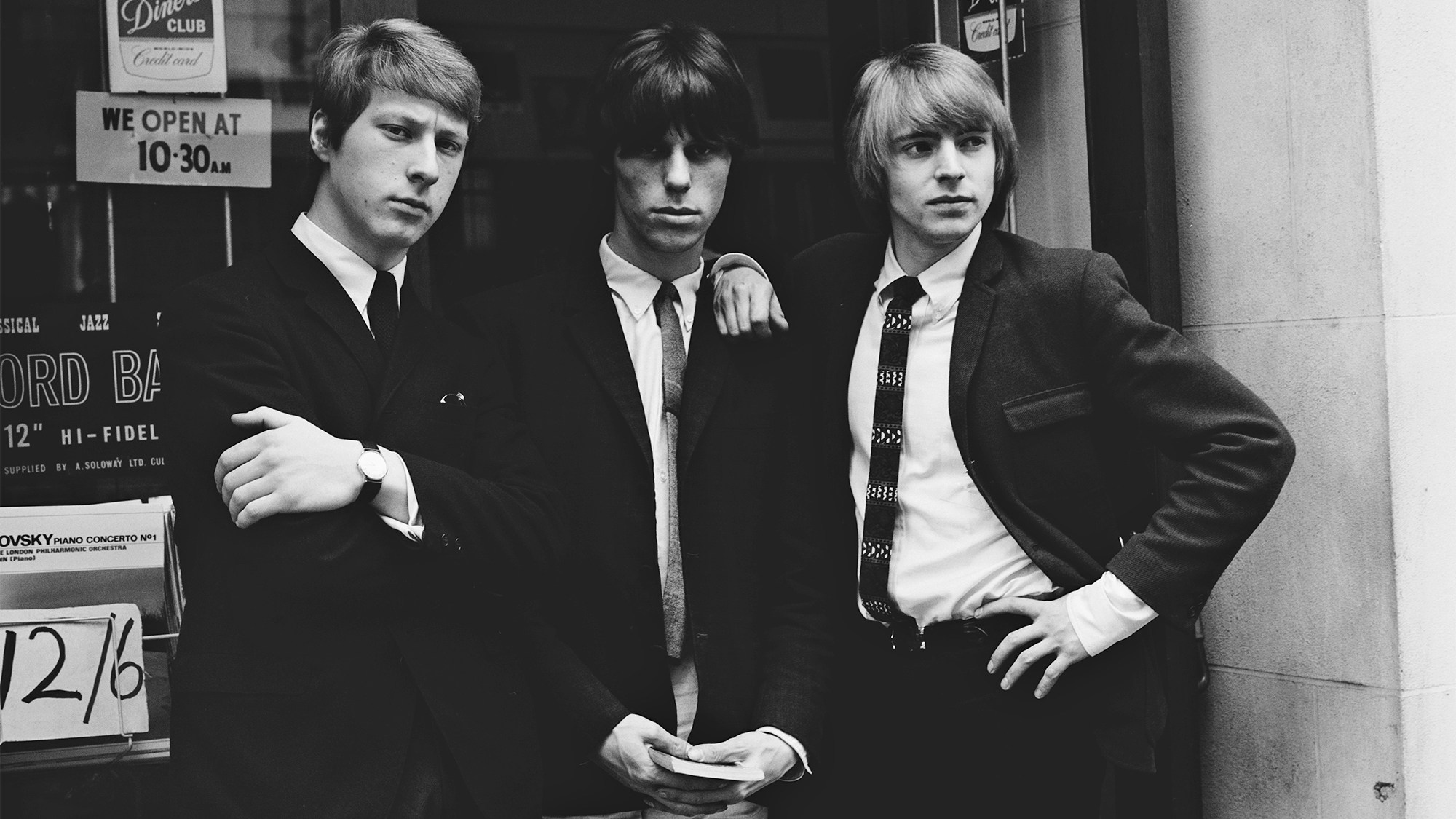 Left to right: rhythm guitarist Chris Dreja, guitarist Jeff Beck, and singer Keith Relf (1943 - 1976) of The Yardbirds, outside a music shop in London, 1965.