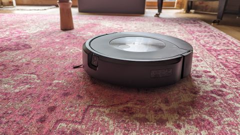 The Roomba Combo J9 Plus vacuuming a carpet