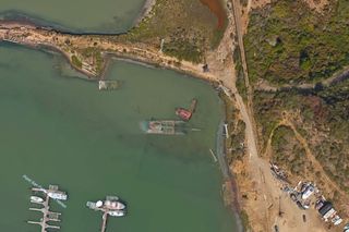 The Point San Pablo Yacht Harbor in Richmond, California, contains a sunken vessel that was purposefully placed there as a breakwater — a barrier that protects the harbor from San Francisco Bay's never-ending waves.