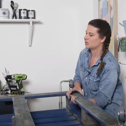  blue coloured pallet coffee table with lady