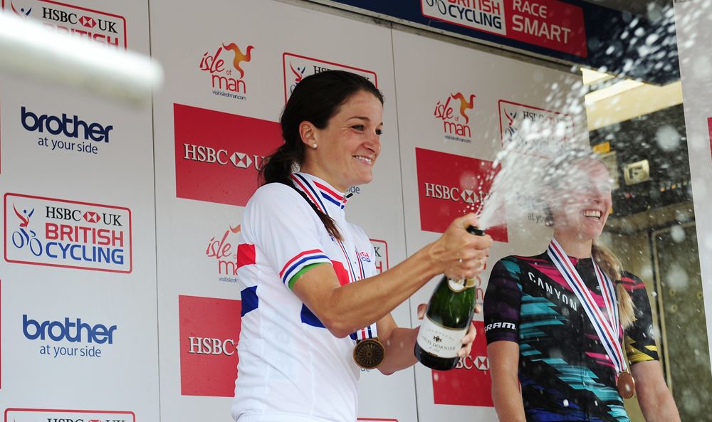 Lizzie Deignan sprays the champagne
