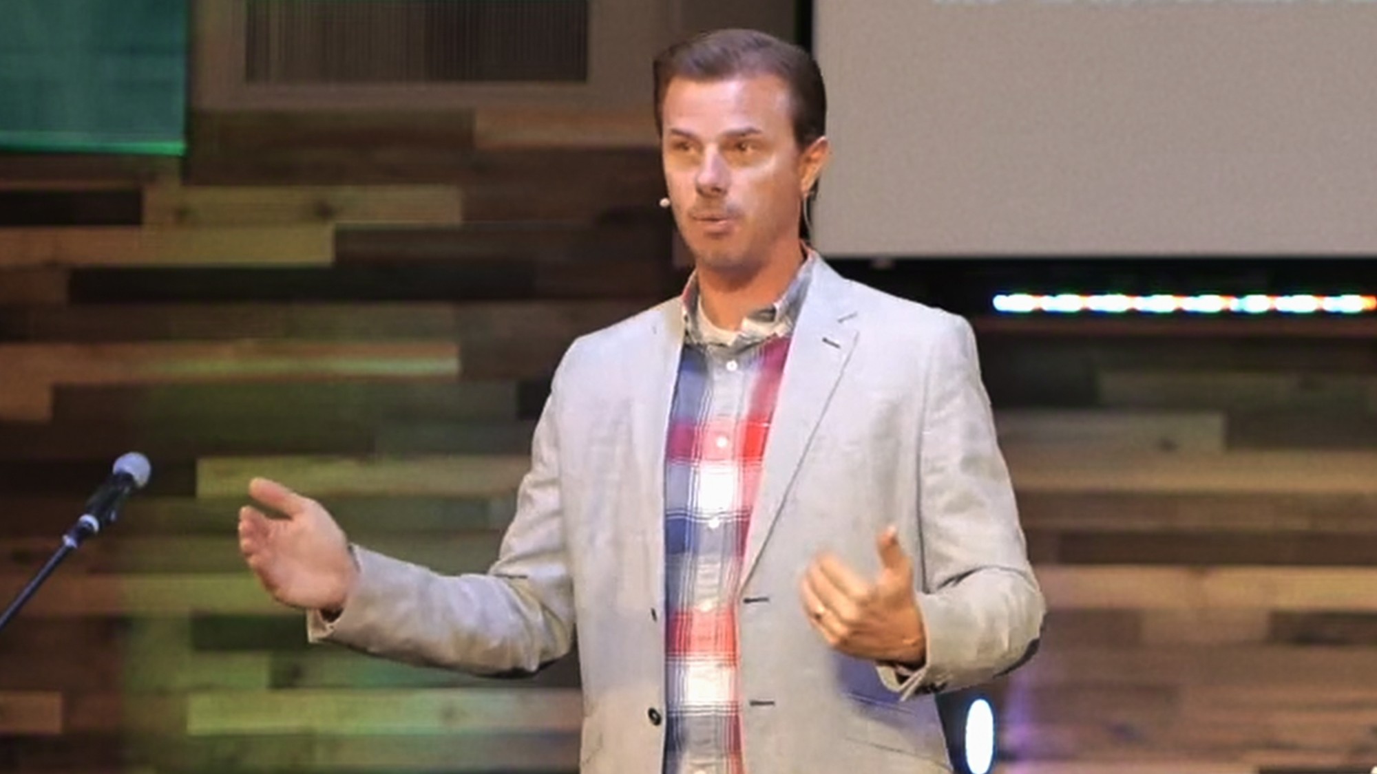 Pastor TJ Miller speaking to his congregation in Death of a Pastor's Wife