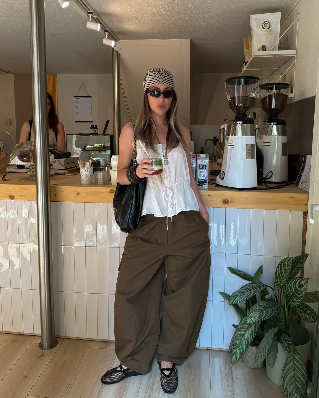 Gigi wearing balloon trousers