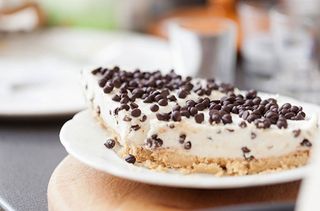 A cheesecake with chocolate chips