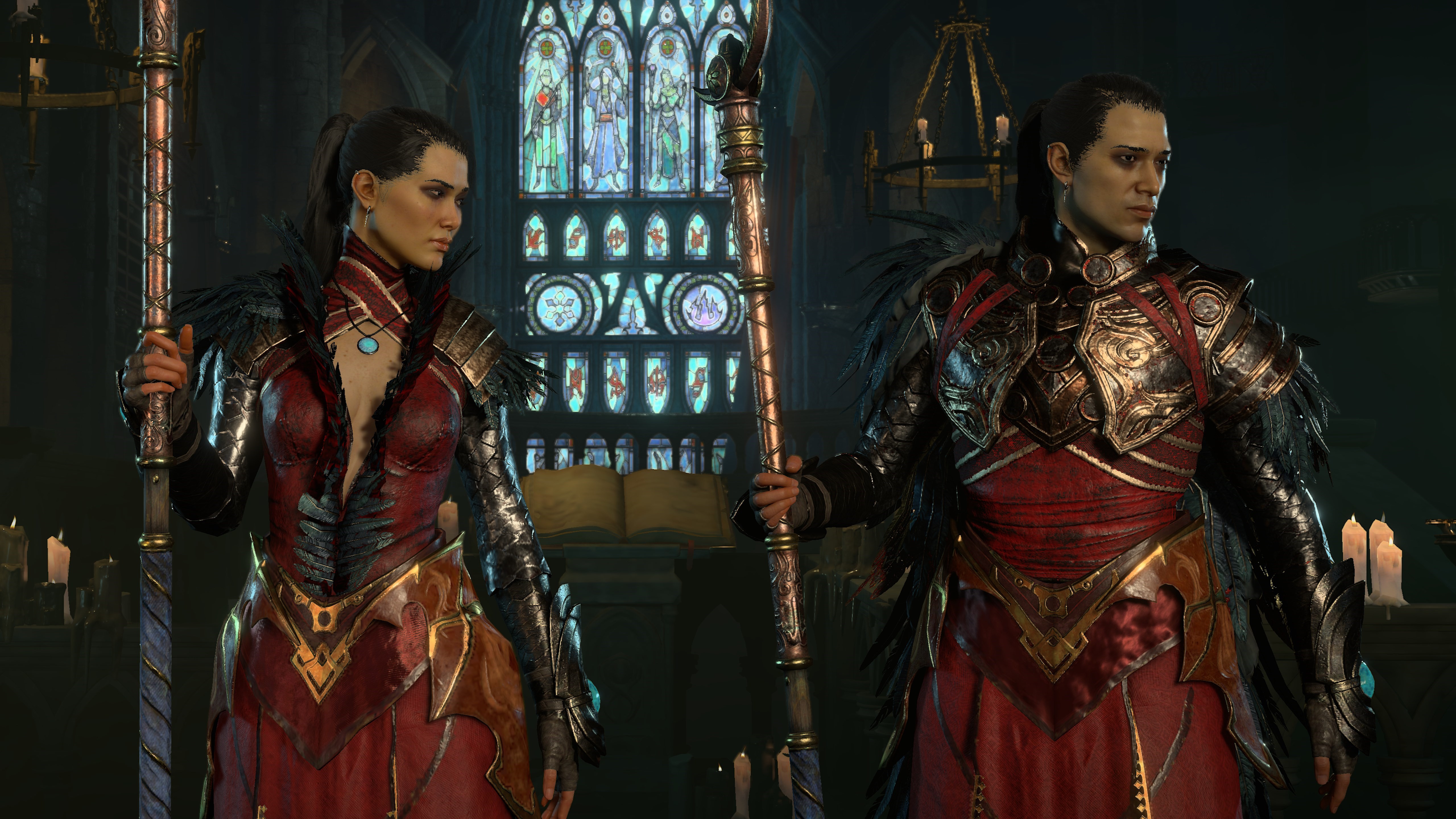 two sorcerers standing next to each other wearing matching red and gold armor