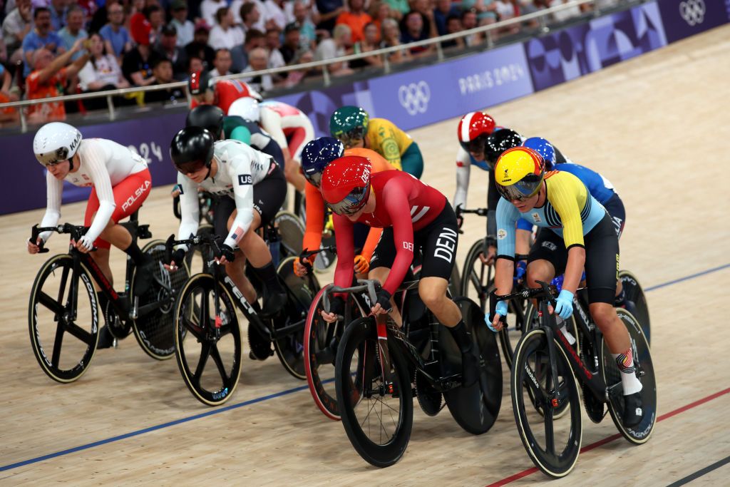 PARIS FRANCE AUGUST 11 LR Jennifer Valente of Team United States Amalie Dideriksen of Team Denmark Lotte Kopecky of Team Belgium and a general view of the peloton competing during the Womens Omnium Elimination Race 34 on day sixteen of the Olympic Games Paris 2024 at SaintQuentinenYvelines Velodrome on August 11 2024 in Paris France Photo by Jared C TiltonGetty Images