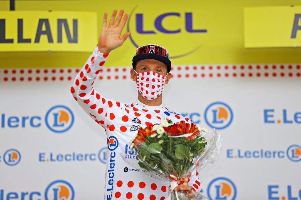 QUILLAN FRANCE JULY 10 Michael Woods of Canada and Team Israel StartUp Nation Polka Dot Mountain Jersey celebrates at podium during the 108th Tour de France 2021 Stage 14 a 1837km stage from Carcassonne to Quillan LeTour TDF2021 on July 10 2021 in Quillan France Photo by Tim de WaeleGetty Images