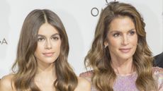 Kaia Gerber and Cindy Crawford attend "Her Time" Omega Photocall as part of the Paris Fashion Week Womenswear Spring/Summer 2018 on September 29, 2017 in Paris, France.