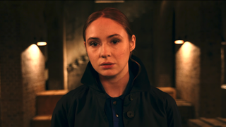 Karen Gillan wearing black in Gunpowder Milkshake