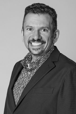 Smiling headshot of Ilya Bukshteyn of Microsoft.