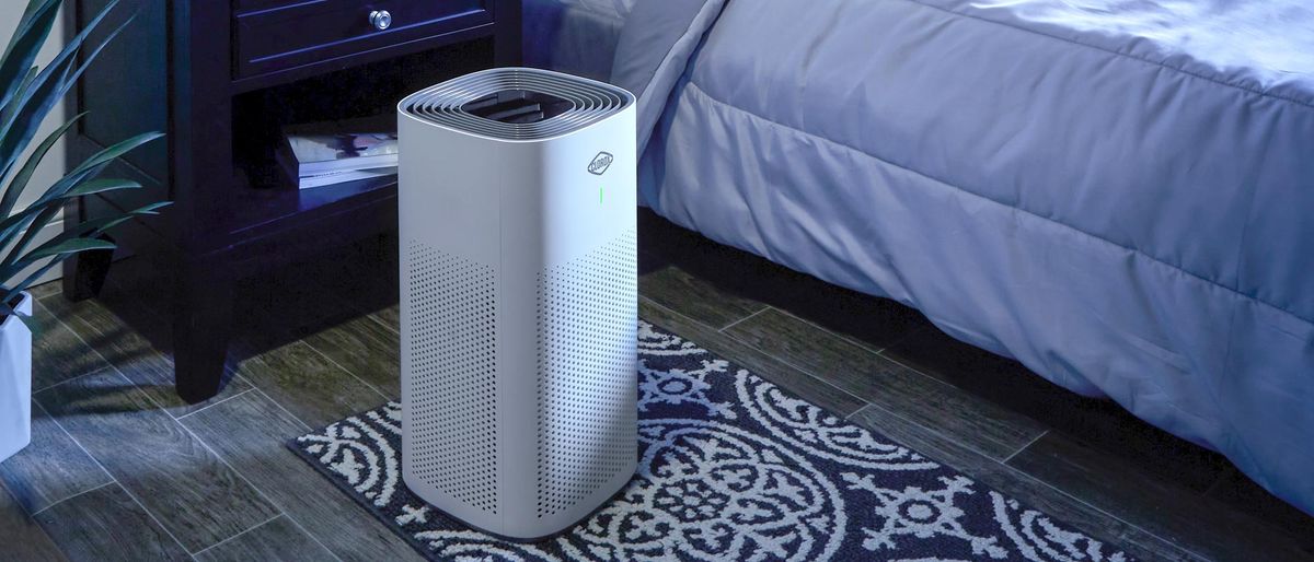 Clorox Large Room True HEPA Air Purifier on a bedroom floor