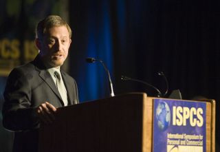 Scientist Alan Stern speaks at the 2009 International Symposium for Personal and Commercial Spaceflight