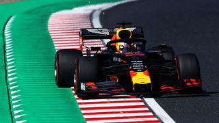Max Verstappen driving the (33) Aston Martin Red Bull Racing RB15 on track during qualifying for the F1 Japanese Grand Prix