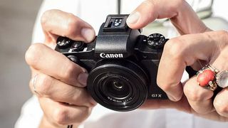Canon PowerShot G1 X Mark III review: hands holding black compact camera
