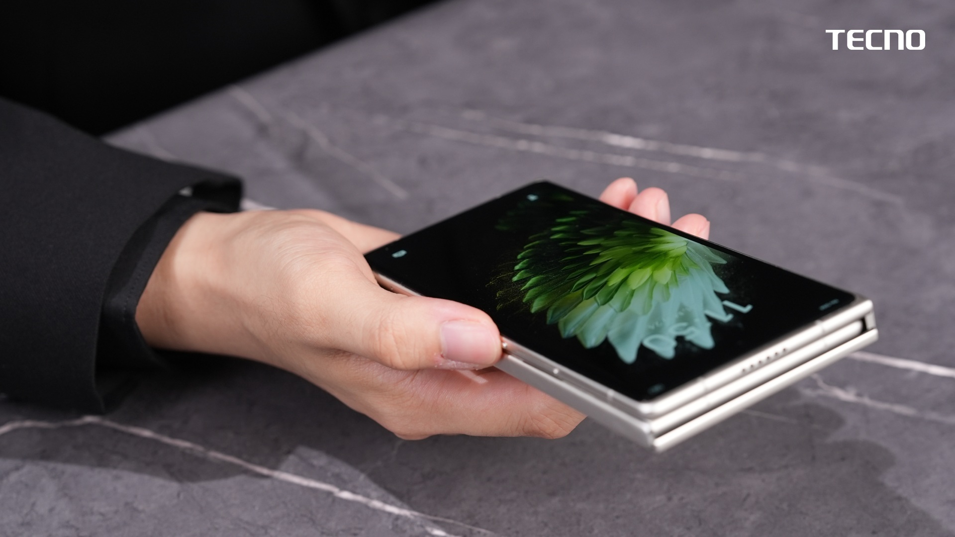 TECNO's G Fold concept fully closed, showing off its cover display that feels close to a regular smartphone.