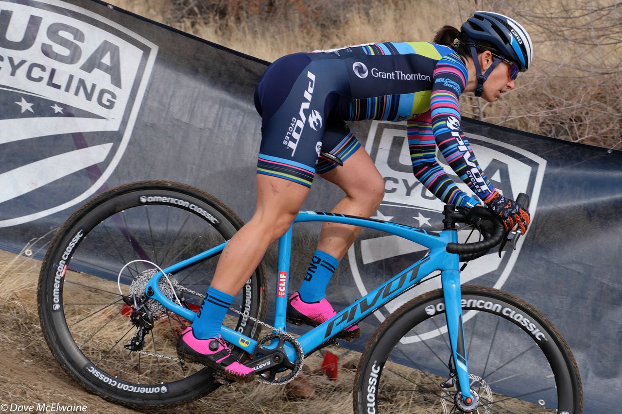 Courtenay McFadden (Pivot) riding alone in fourth place during lap four
