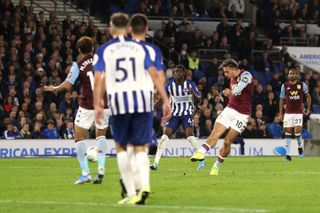 Jack Grealish, right, scores Villa's third goal against Brighton