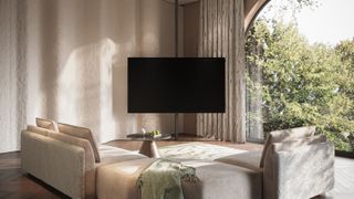 Loewe bild i.77 dr+ OLED TV mounted on the floor to ceiling pole stand