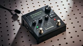An Eventide H9 Harmonizer Gen 2 multi-effects pedal on a white pegboard