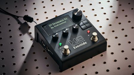 An Eventide H9 Harmonizer Gen 2 multi-effects pedal on a white pegboard