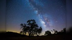The Milky Way and several "shooting stars" or meteors from the Perseid meteor shower in 2015.