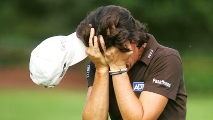 Juli Inkster with her head in her hands 