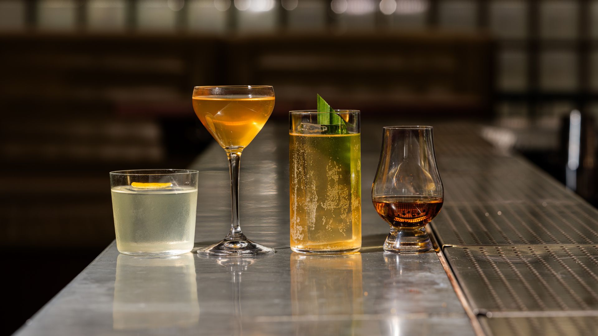 an image of the three cocktails created for the listening experience alongside a neat pour of the Glendronach 12 year old on the bar