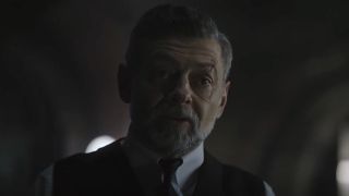 Alfred Pennyworth, as portrayed by Andy Serkis in "The Batman," is distinguished by his salt-and-pepper beard and his impeccably dressed suit and tie. 