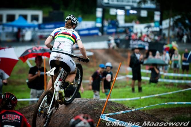 Alexandra Engen (Ghost Factory Racing) over a slippery berm